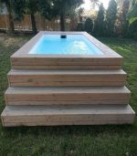 Piscina contenedor con revestimiento de madera - Imagen 5