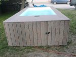 Piscina contenedor con revestimiento de madera - Imagen 8