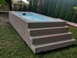 Piscina contenedor con revestimiento de madera - Imagen 7