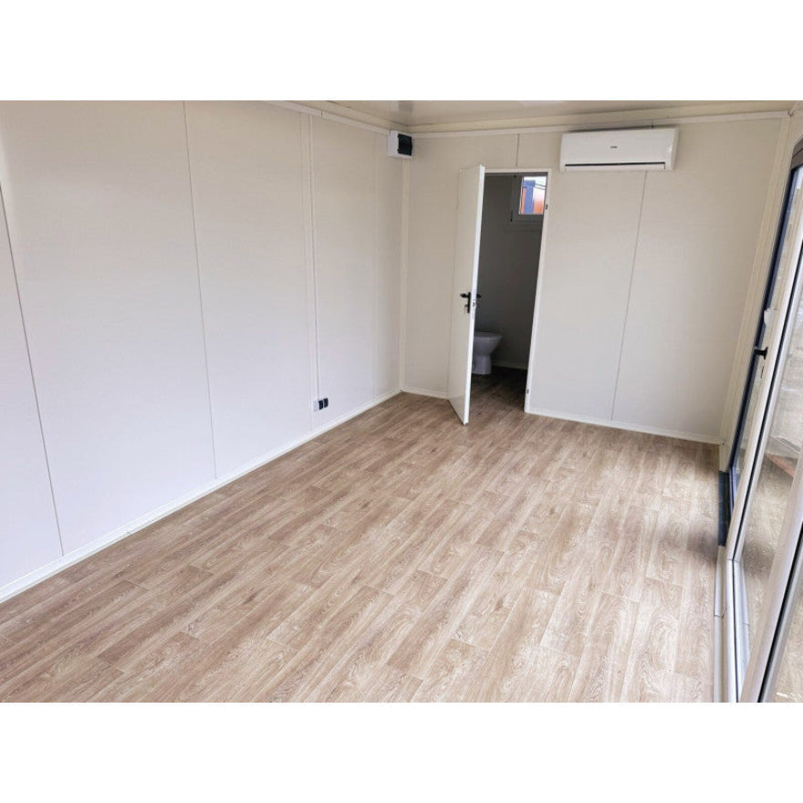 Contenedor elevado 7×3 m con grandes vitrinas, aire acondicionado y baño - Imagen 10